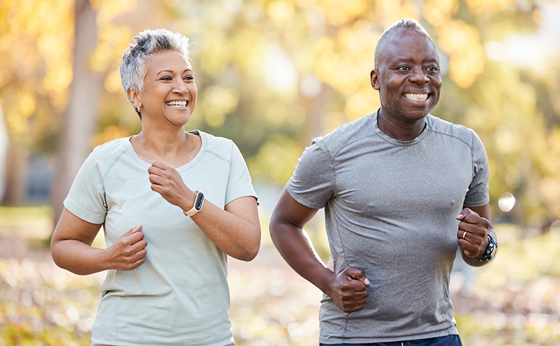 Athletic mature couple jogging